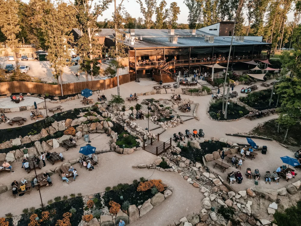 The outdoor terrace and distillery campus at Hard Truth Distilling Co. in Brown County, Indiana