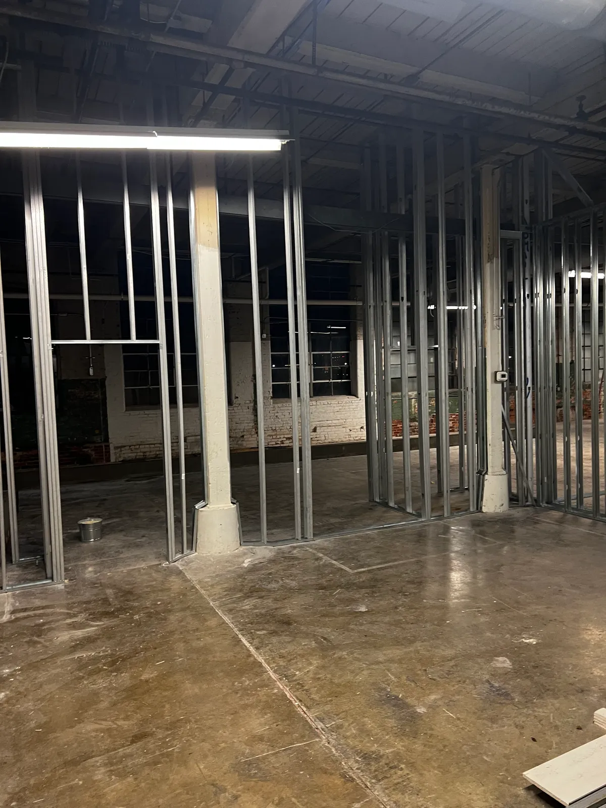 Steel stud framing inside the new Irons One Distillery space at Lowe Mill