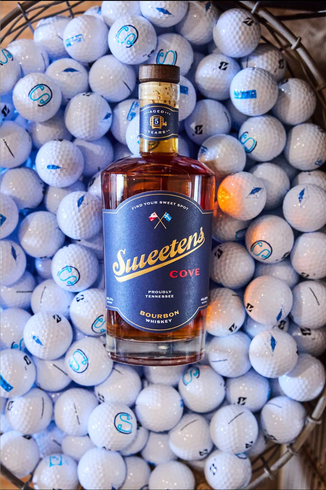 Sweetens Cove bourbon poured into shot glasses — the golf-course shot tradition that became the brand