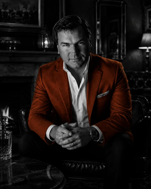 Rob B., founder of Boozemakers, with a glass of whiskey